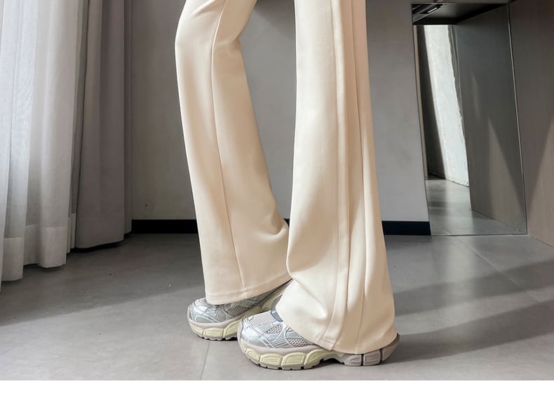Tel tot 10 - Effen wijd uitlopende broek met trekkoord in de taille (verschillende ontwerpen)