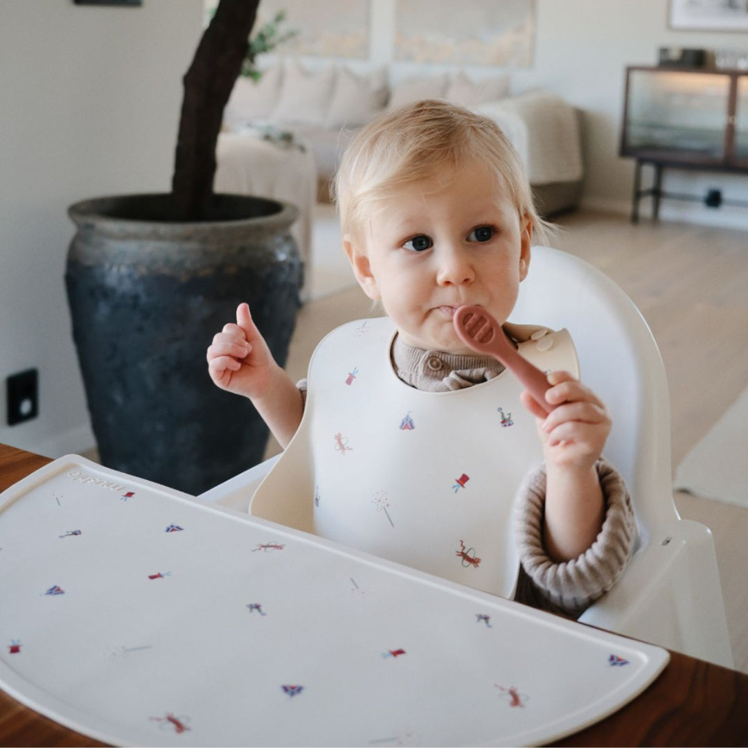 mushie placemat - circus
