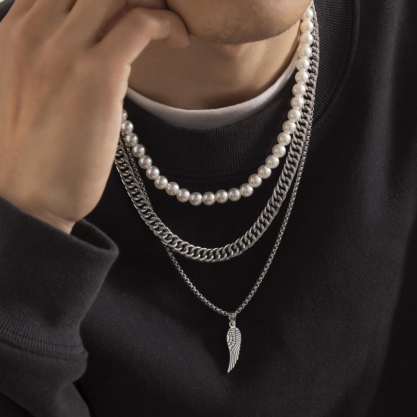 Gretlyn - Set: Kunstparelketting + Ketting + Vleugelhangerketting