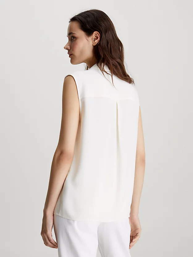 Blusa sem mangas com bolso