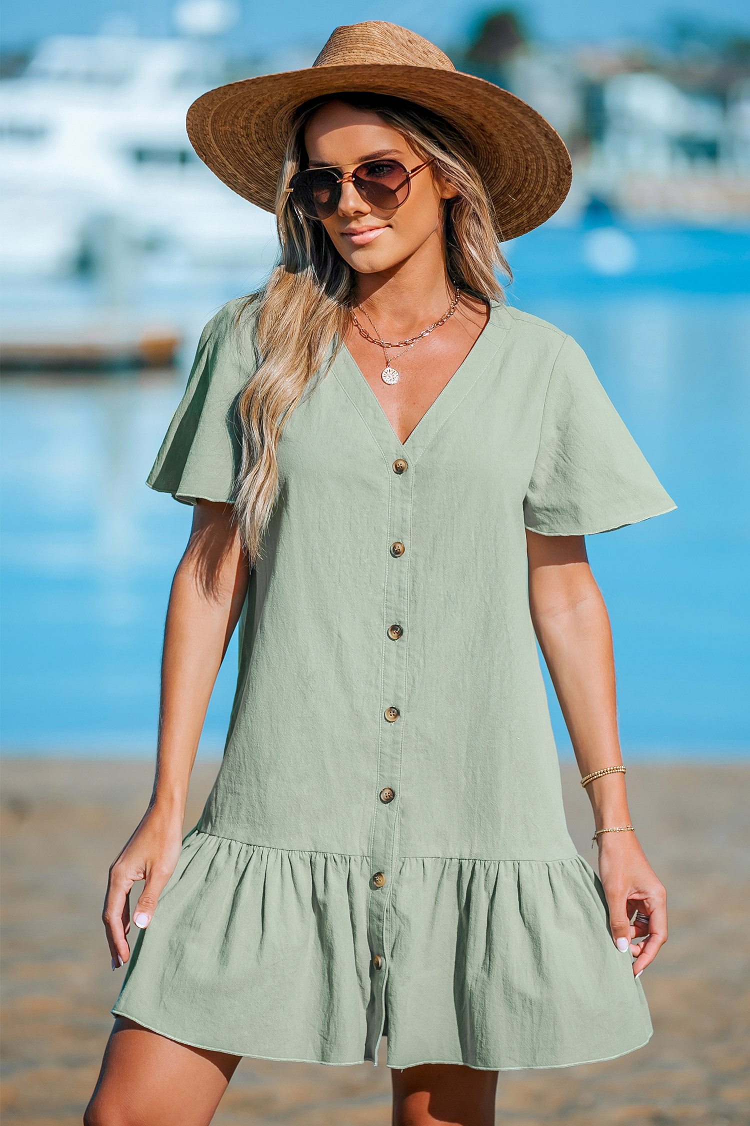Robe en pur coton avec col en V et boutons à volants