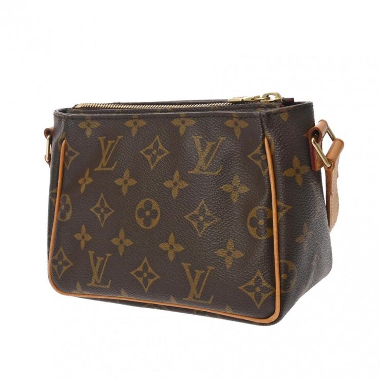 Louis Vuitton Vintage Louis Vuitton Cite Brown