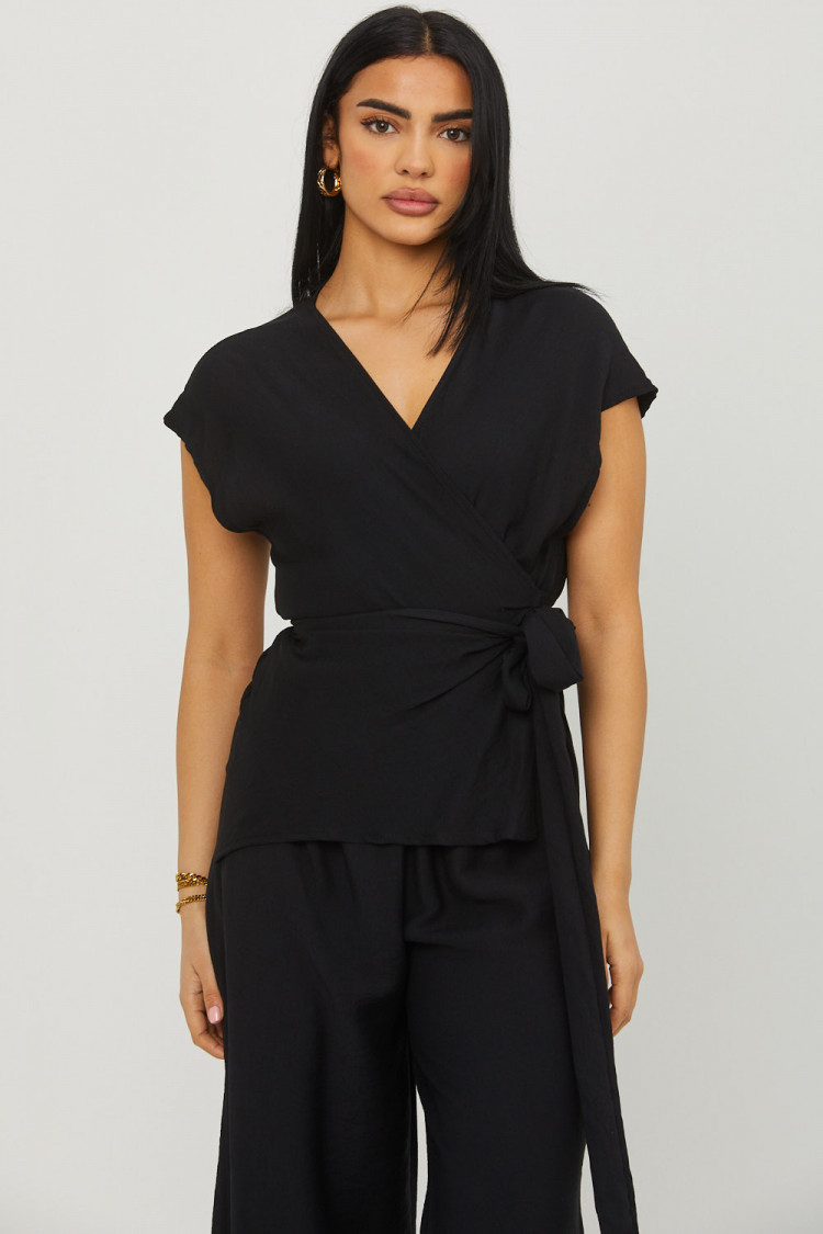 Combinaison pantalon noire décolleté croisé a noué