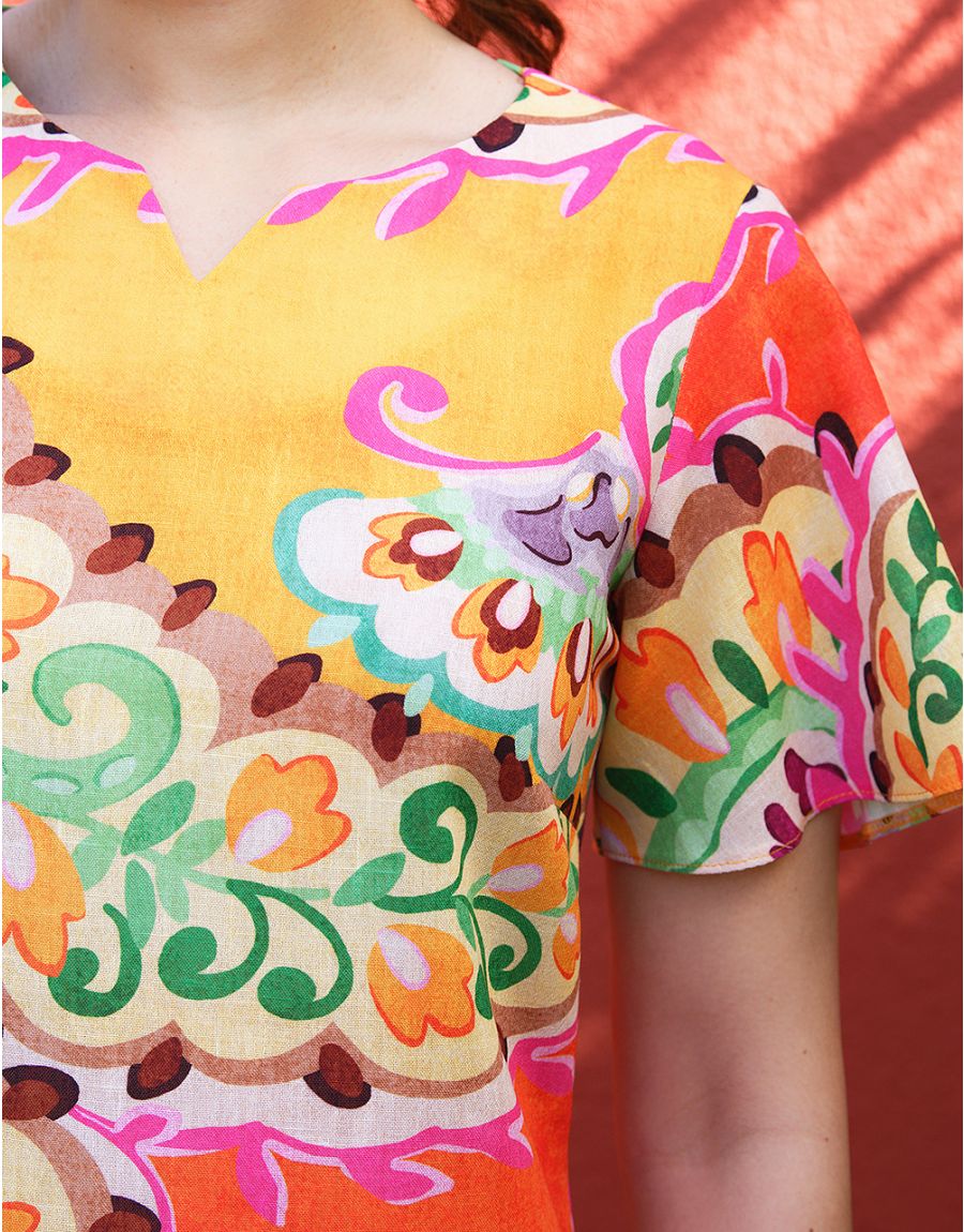 Robe chic orange imprimée