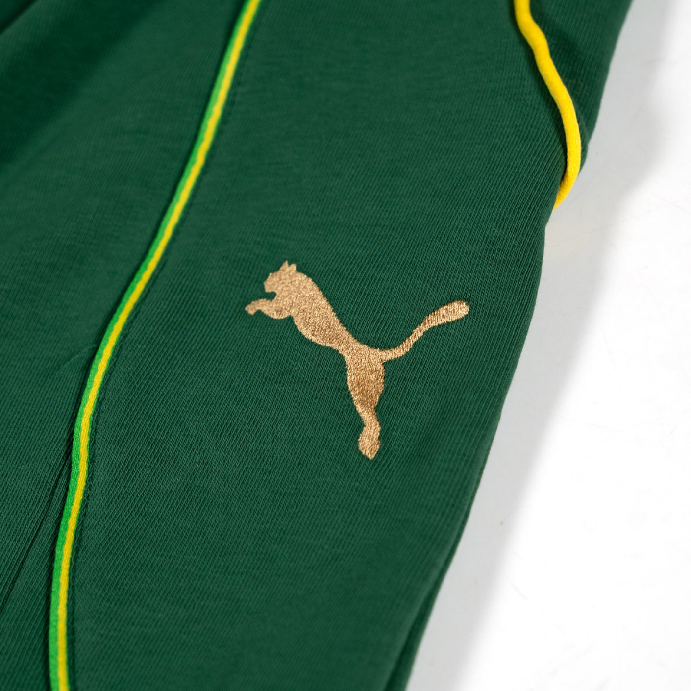 PUMA King Pelé Joggingbroek Donkergroen Geel