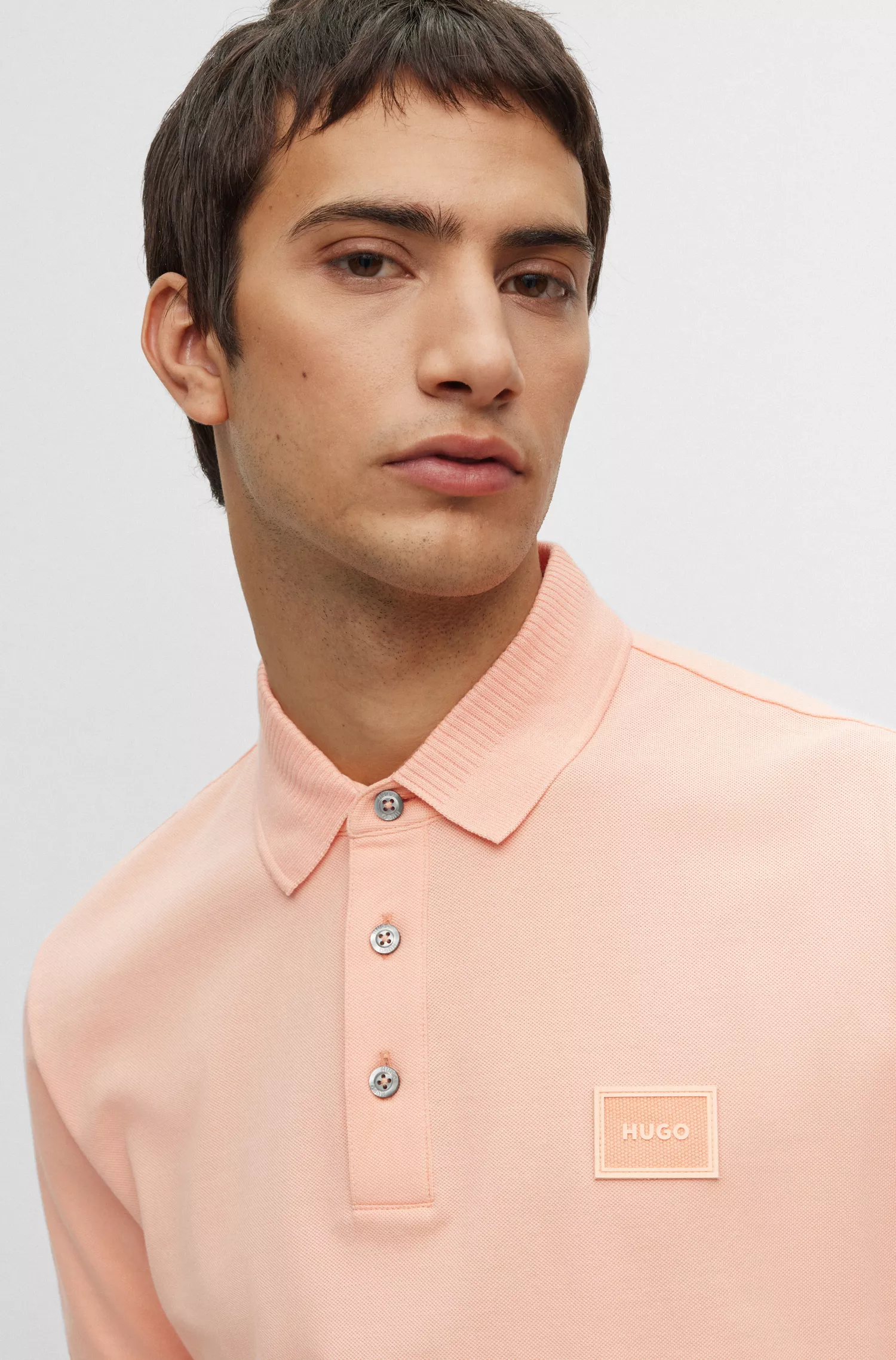 Camisa polo HUGO vermelha em piqué de algodão com corte slim e emblema com o logotipo.