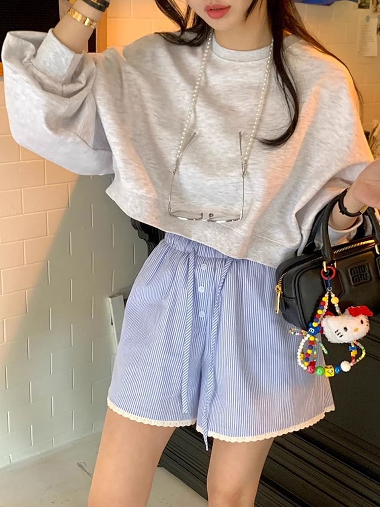 Coris - Shorts met hoge taille en kanten rand