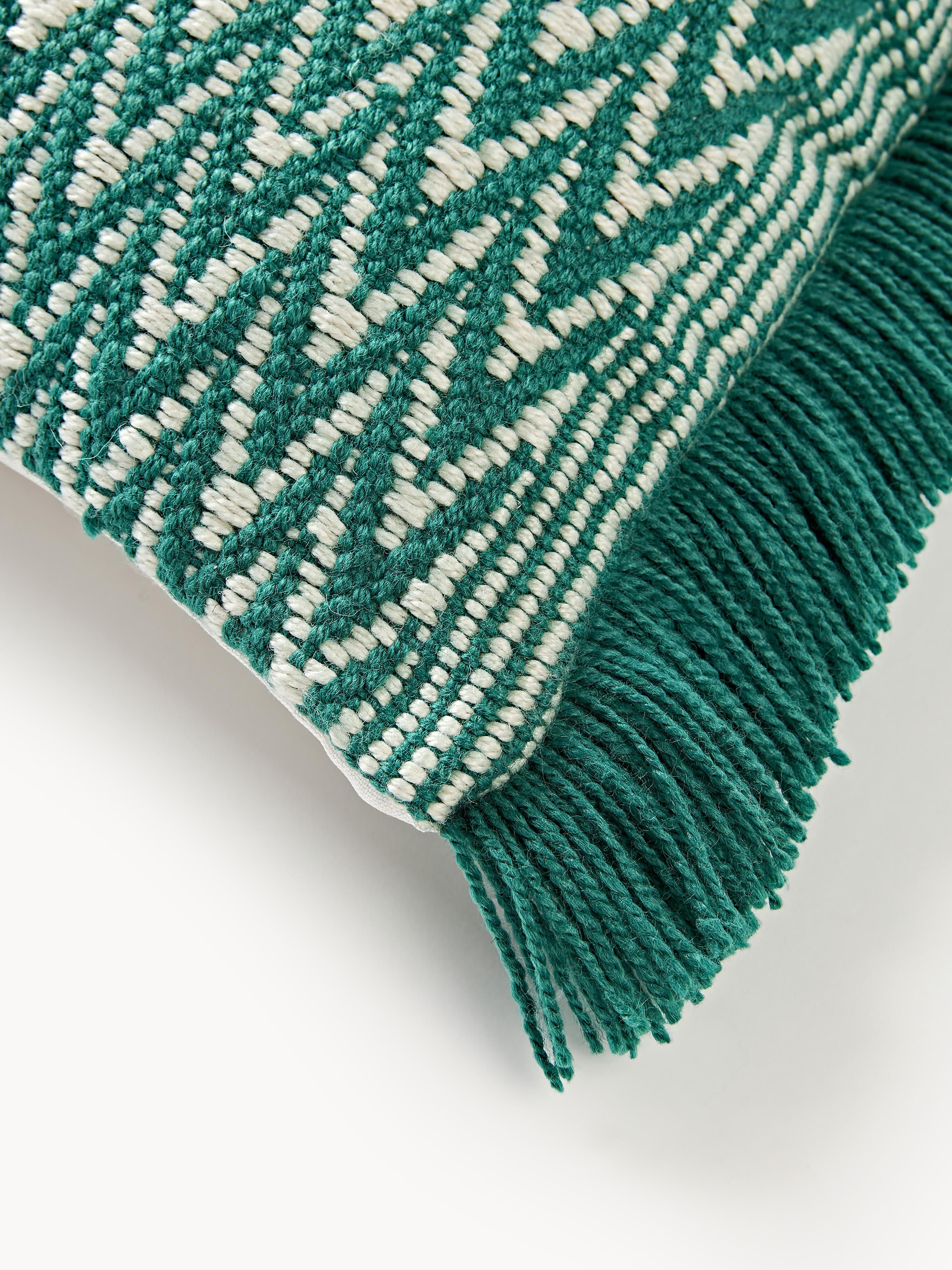 Outdoor kussenhoes Suria met geweven patroon en franjes