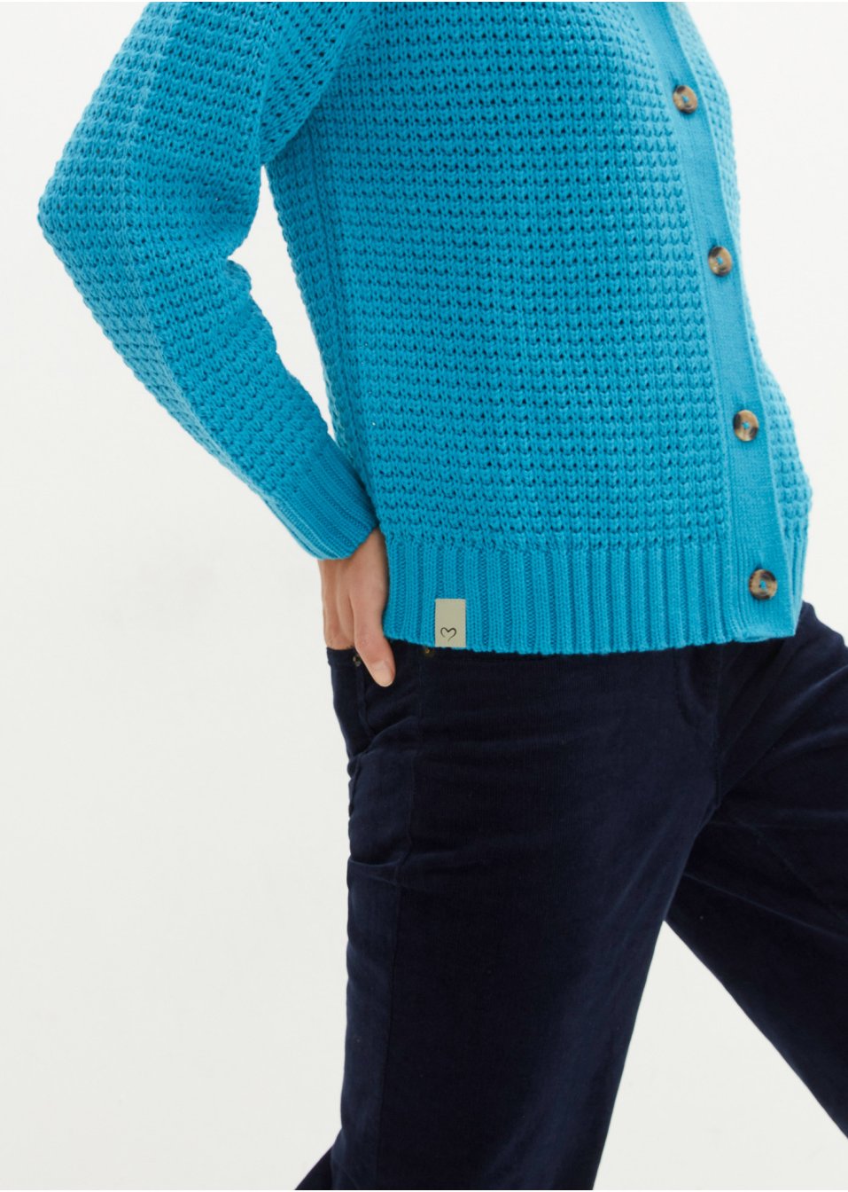 Veste en maille à gros boutons et capuche