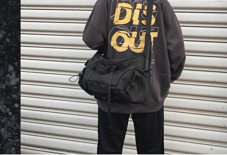 SUNMAN - Effen nylon crossbodytas