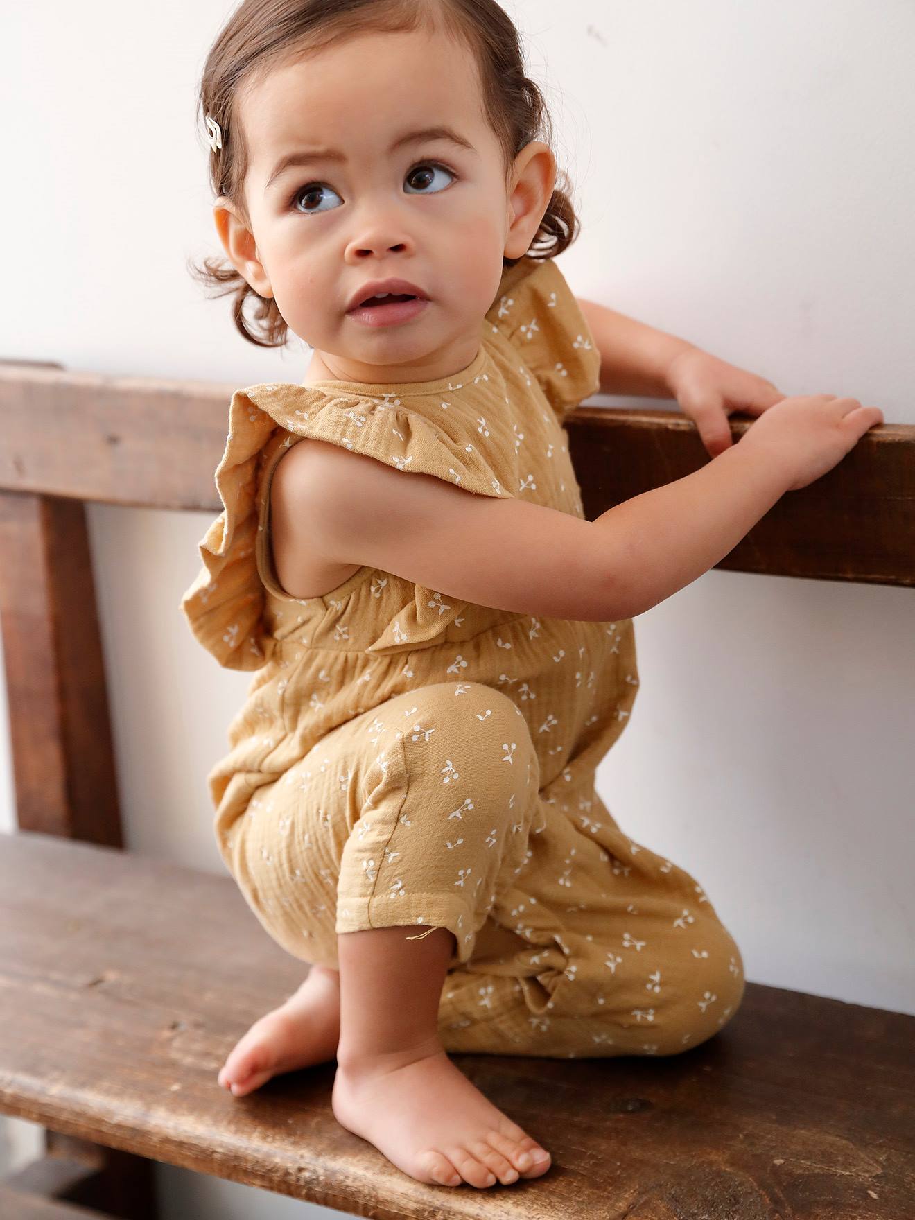 Macacão de bebê em chiffon de algodão amarelo claro