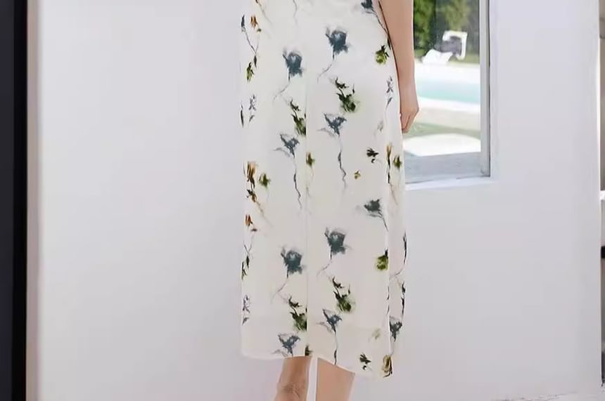 Puffie - Midi-jurk met spaghettibandjes en bloemenprint