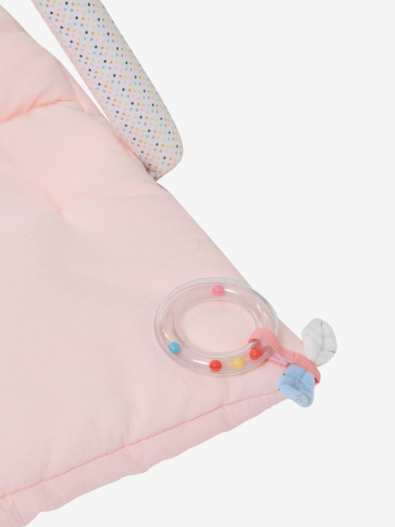 Área de estimulação com gaze de algodão rosa