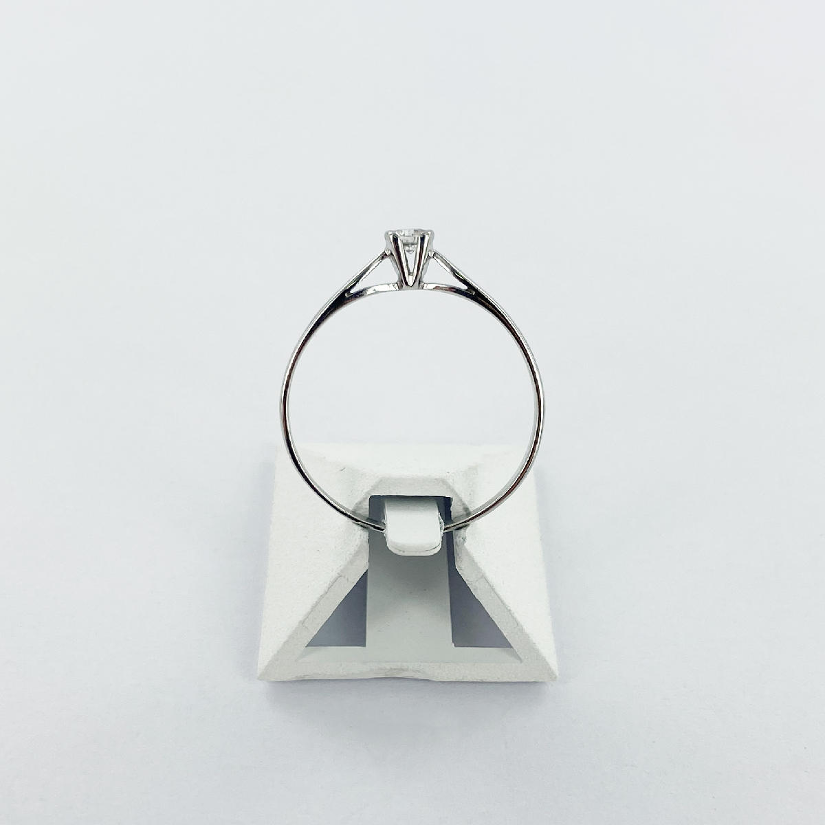 Solitaire d'occasion or 750 blanc diamant 0.15 carat.