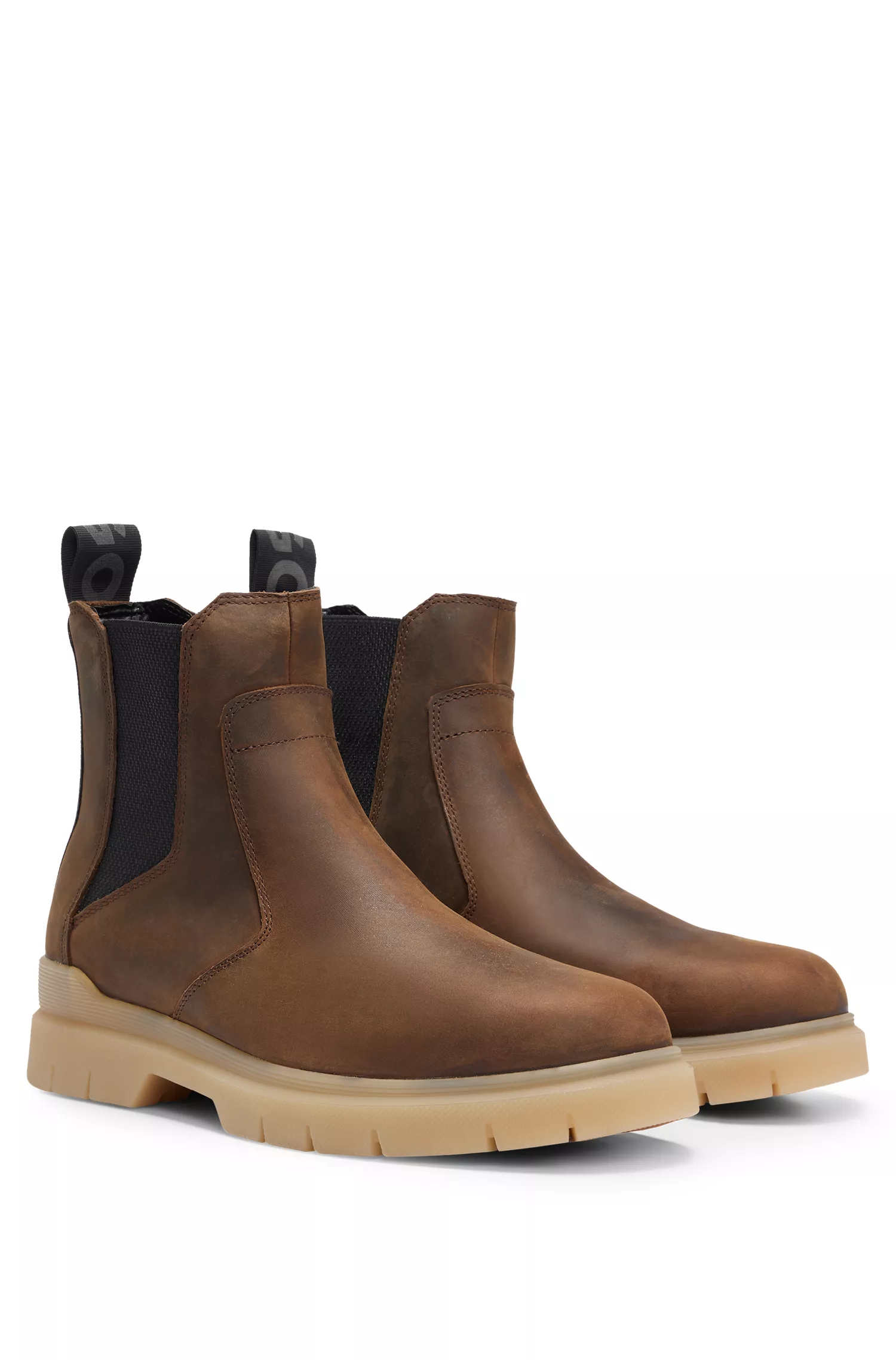 Botas Chelsea HUGO em couro vermelho com detalhe em fita com o logotipo.