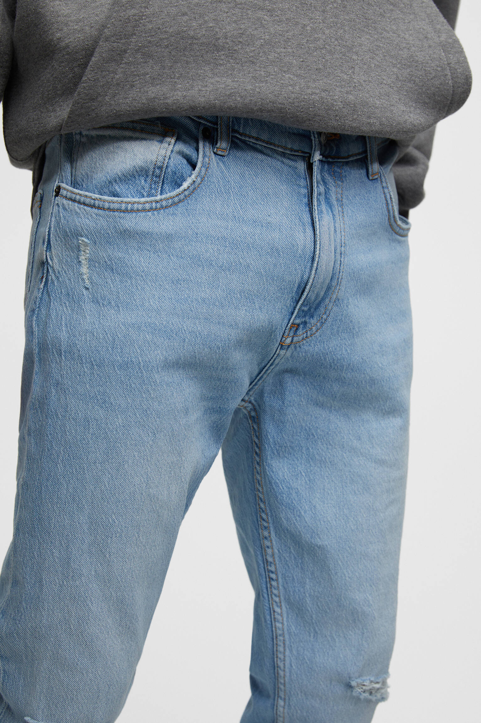 CALÇA JEANS SKINNY RASGADA - ÍNDIGO CLARO