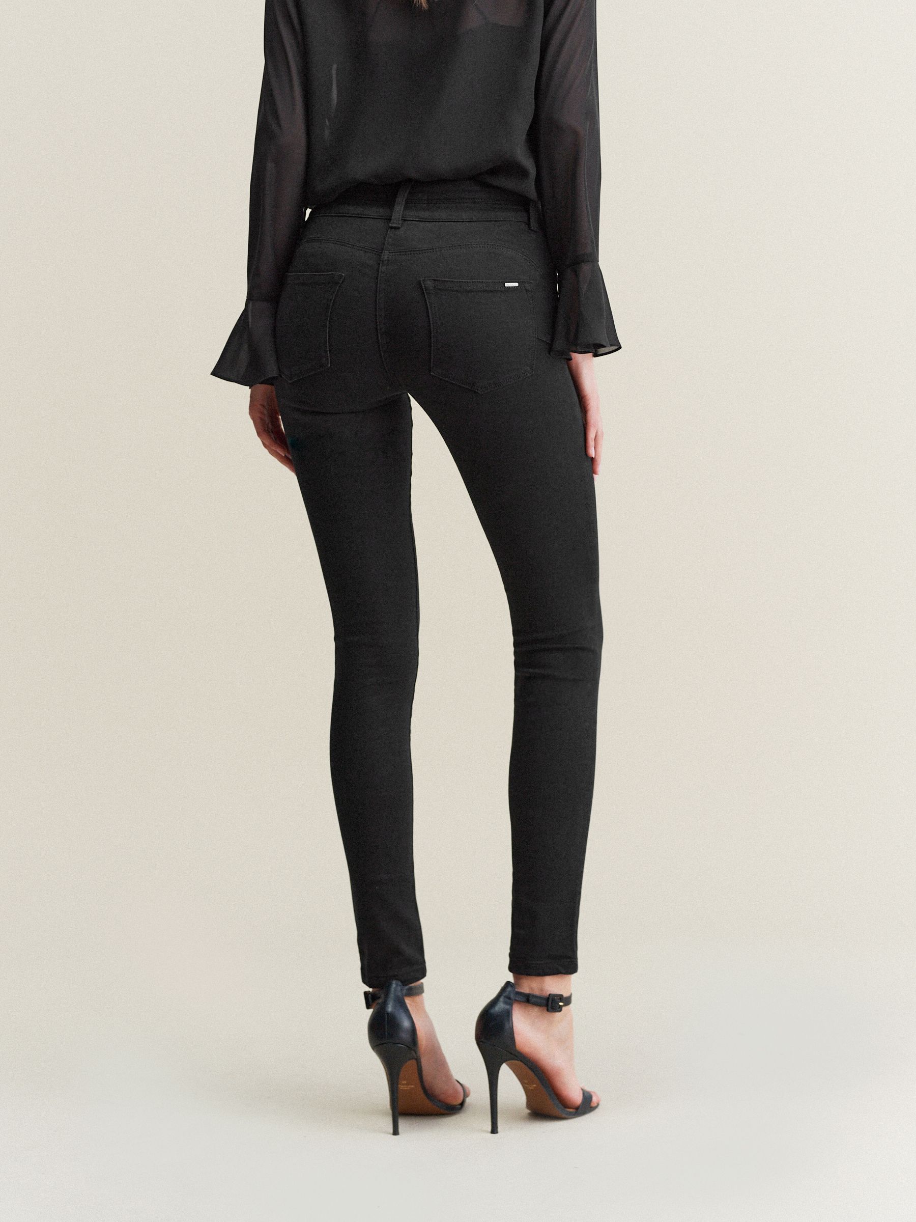 Zwart - Skinny jeans met verlengings- en afslankeffect