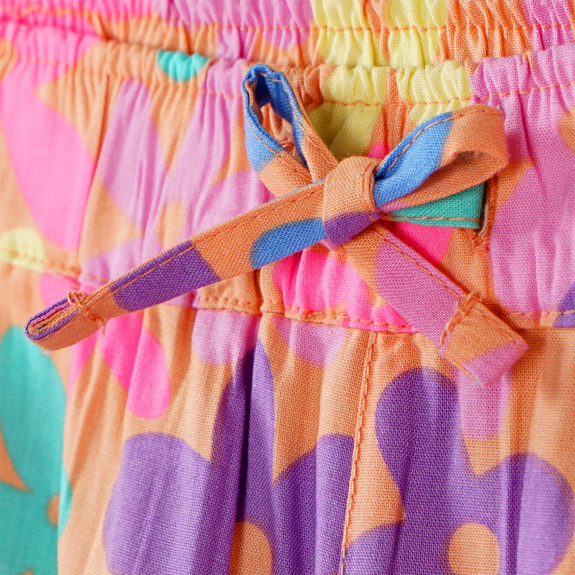Yigga Mädchen Hose mit bunten Blumen hellorange