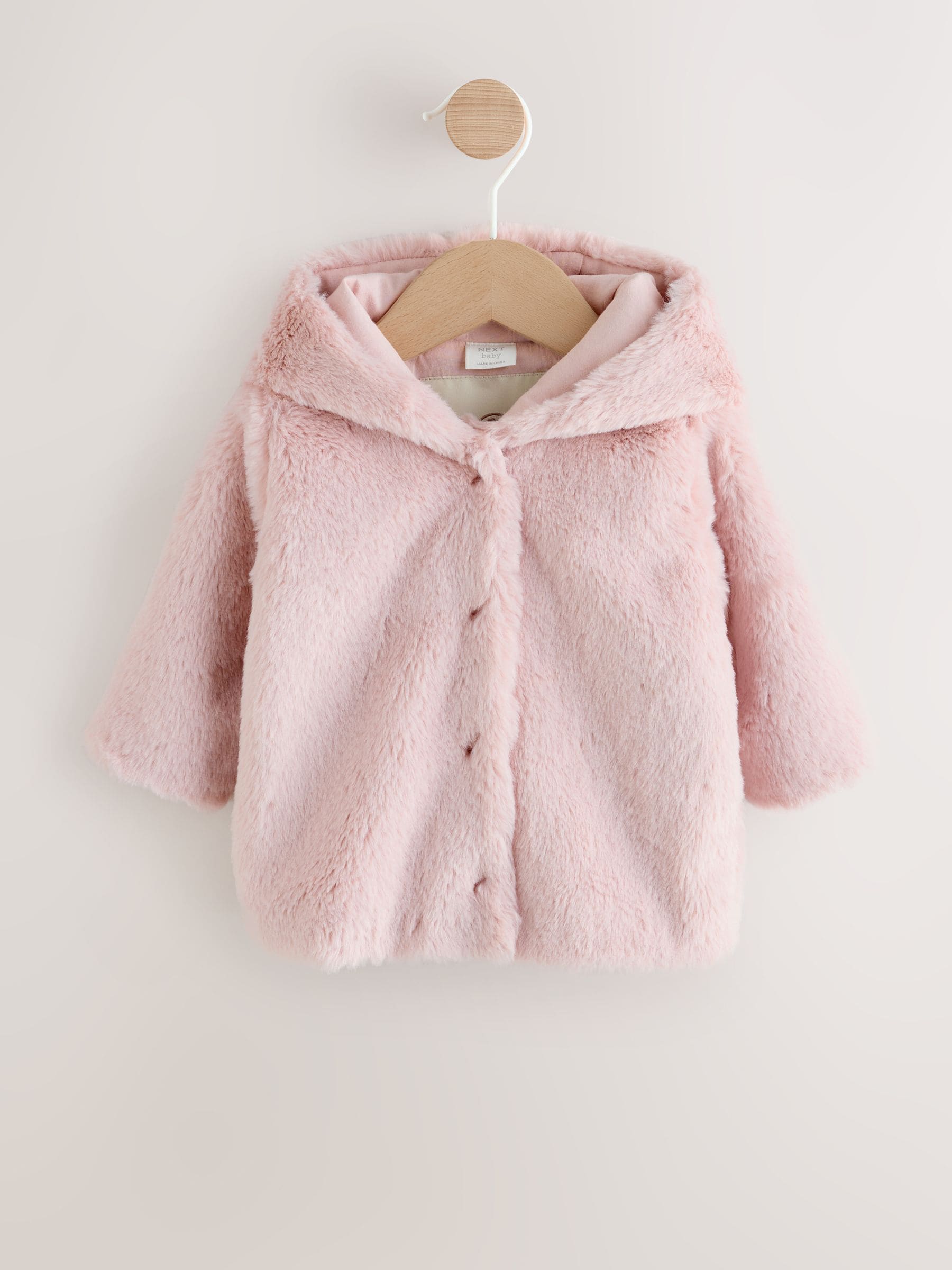 Roze - Babyjack met capuchon van imitatiebont (0mnd -2jr)
