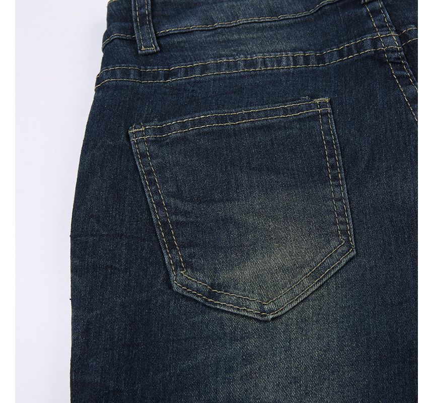 Puffie - Lage taille, gewassen bootcut jeans met pijlprint