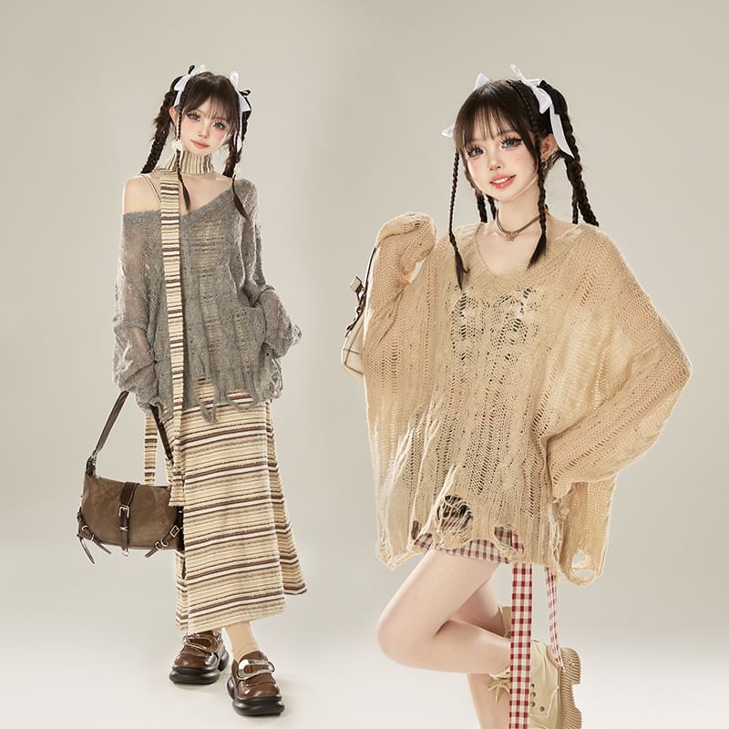 KUMI - Lange mouwen, effen gebreide top met distressed effect