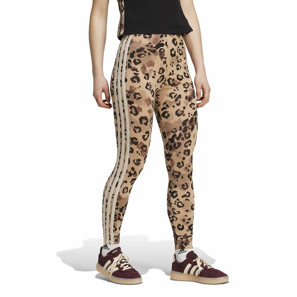 Calça legging ADIDAS SPORTSWEAR<br>Com estampa de leopardo e 3 listras
