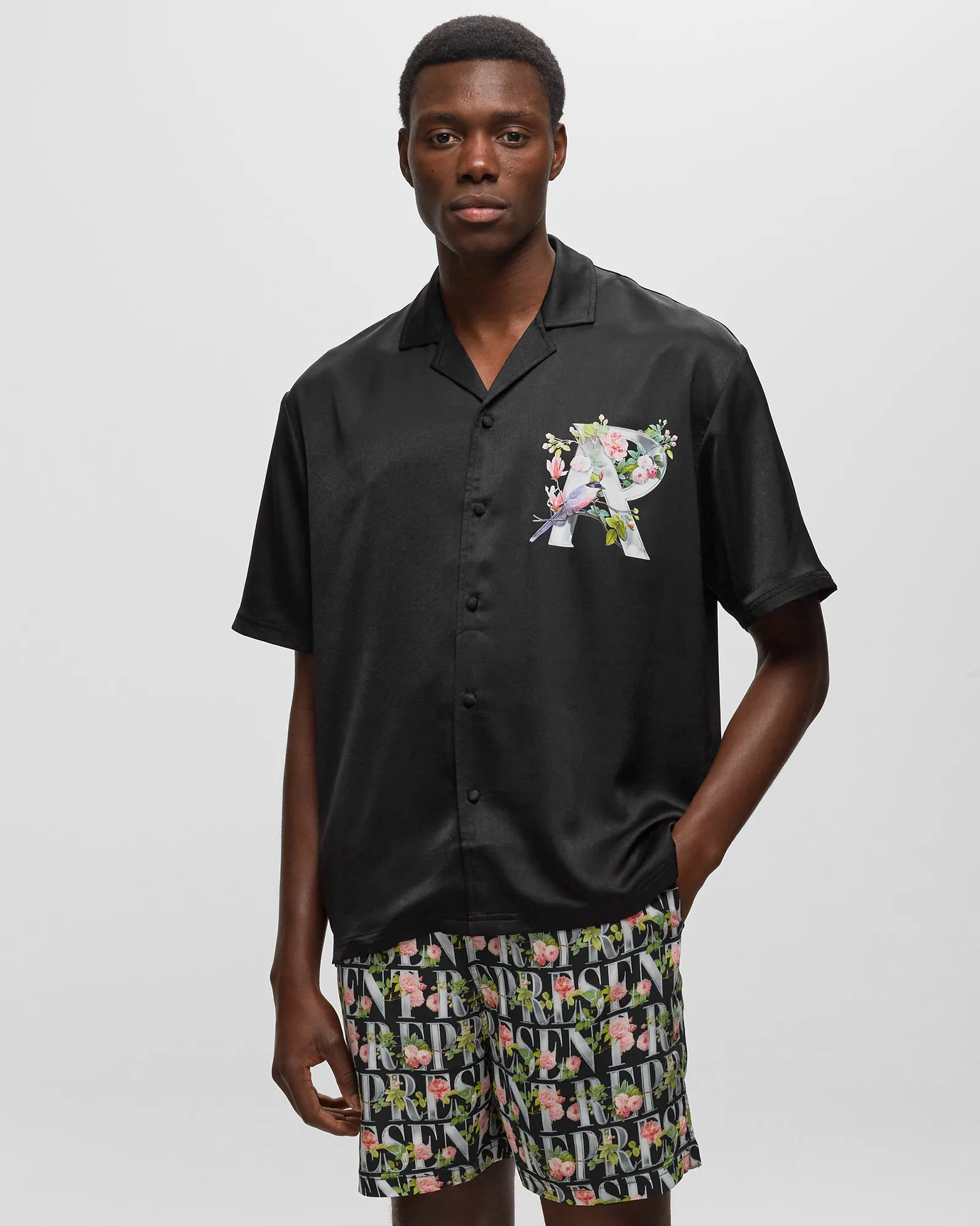 Represent FLORAL R SHIRT
