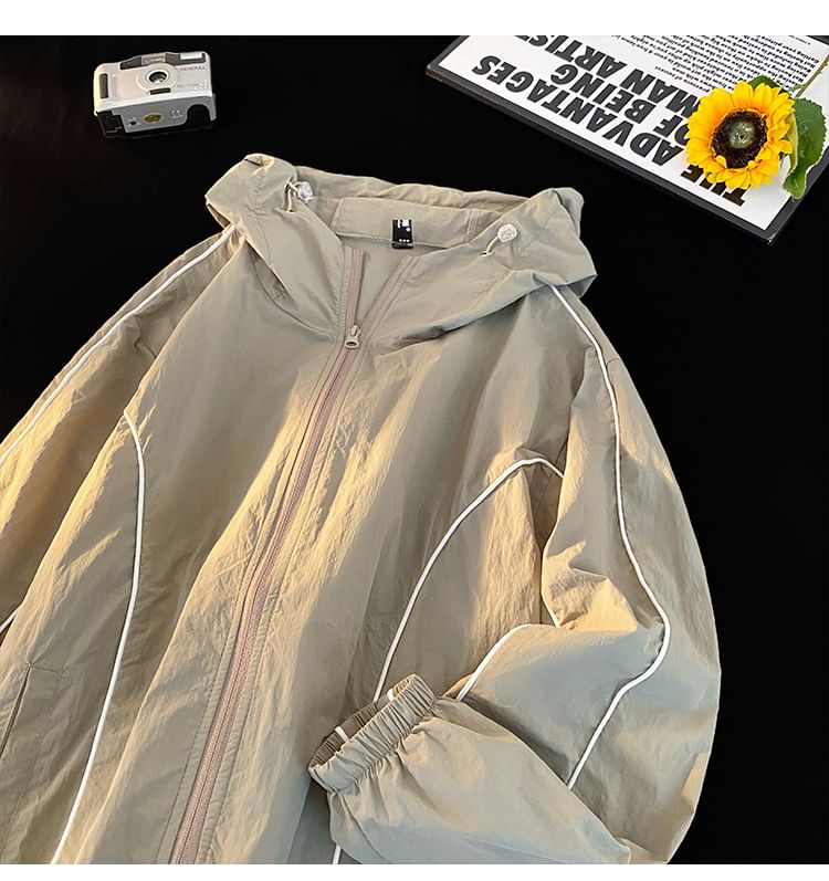 Mimiyox - Windjack met capuchon en contrasterende rand en rits
