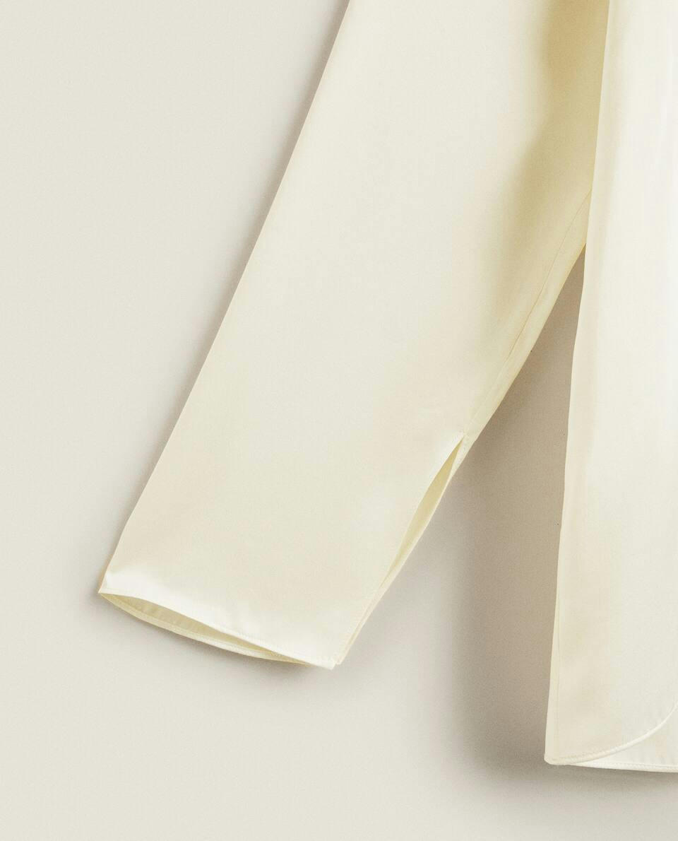 Blusa de seda crua