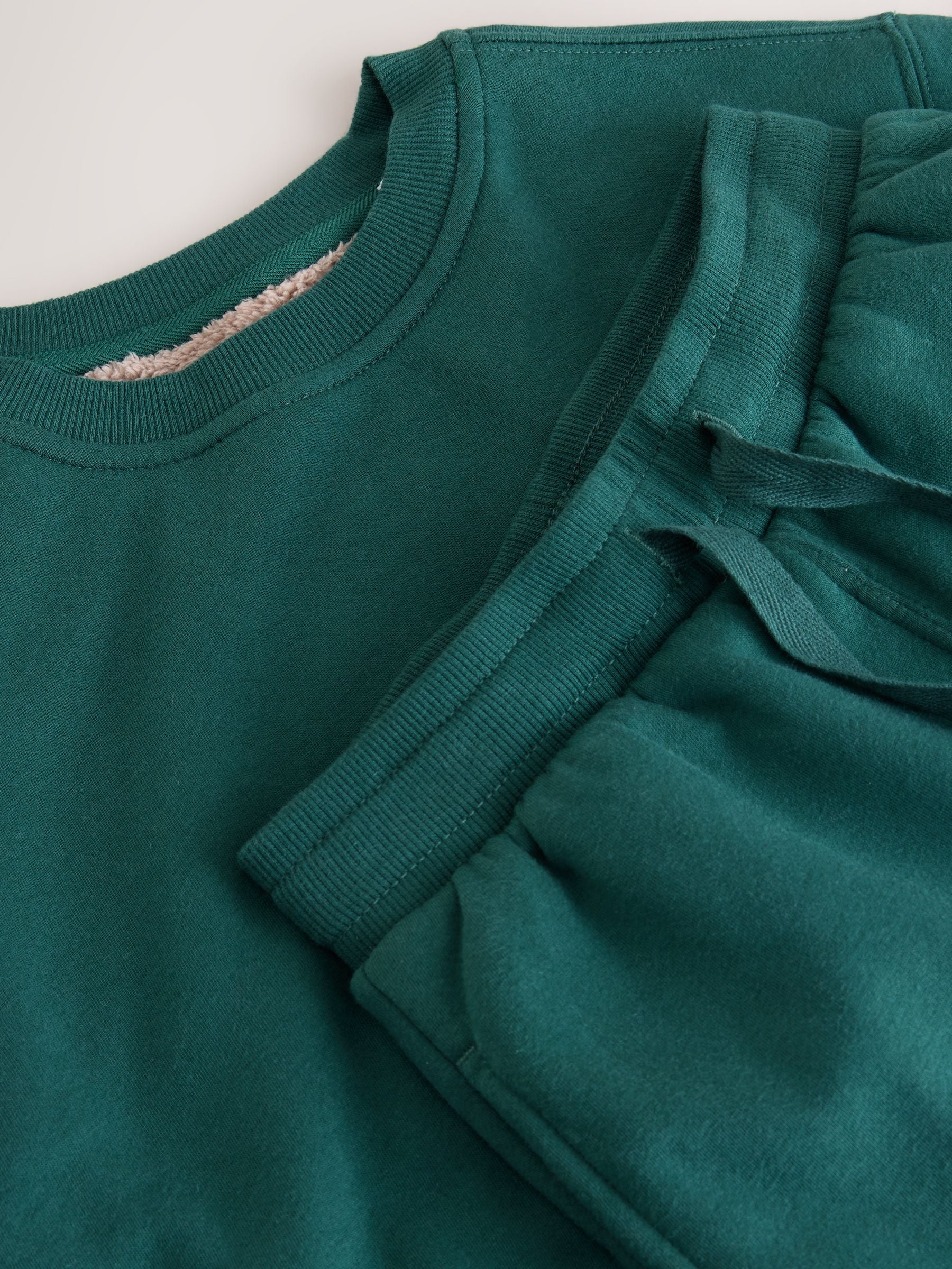 Blauwgroen - Enkele behaaglijke fleece pyjama (3 - 16 jr)