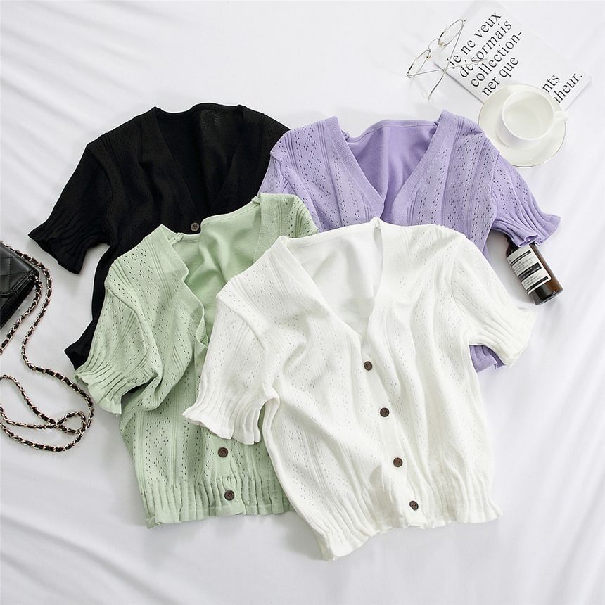 Muezz - Pointelle gebreide cardigan met korte mouwen
