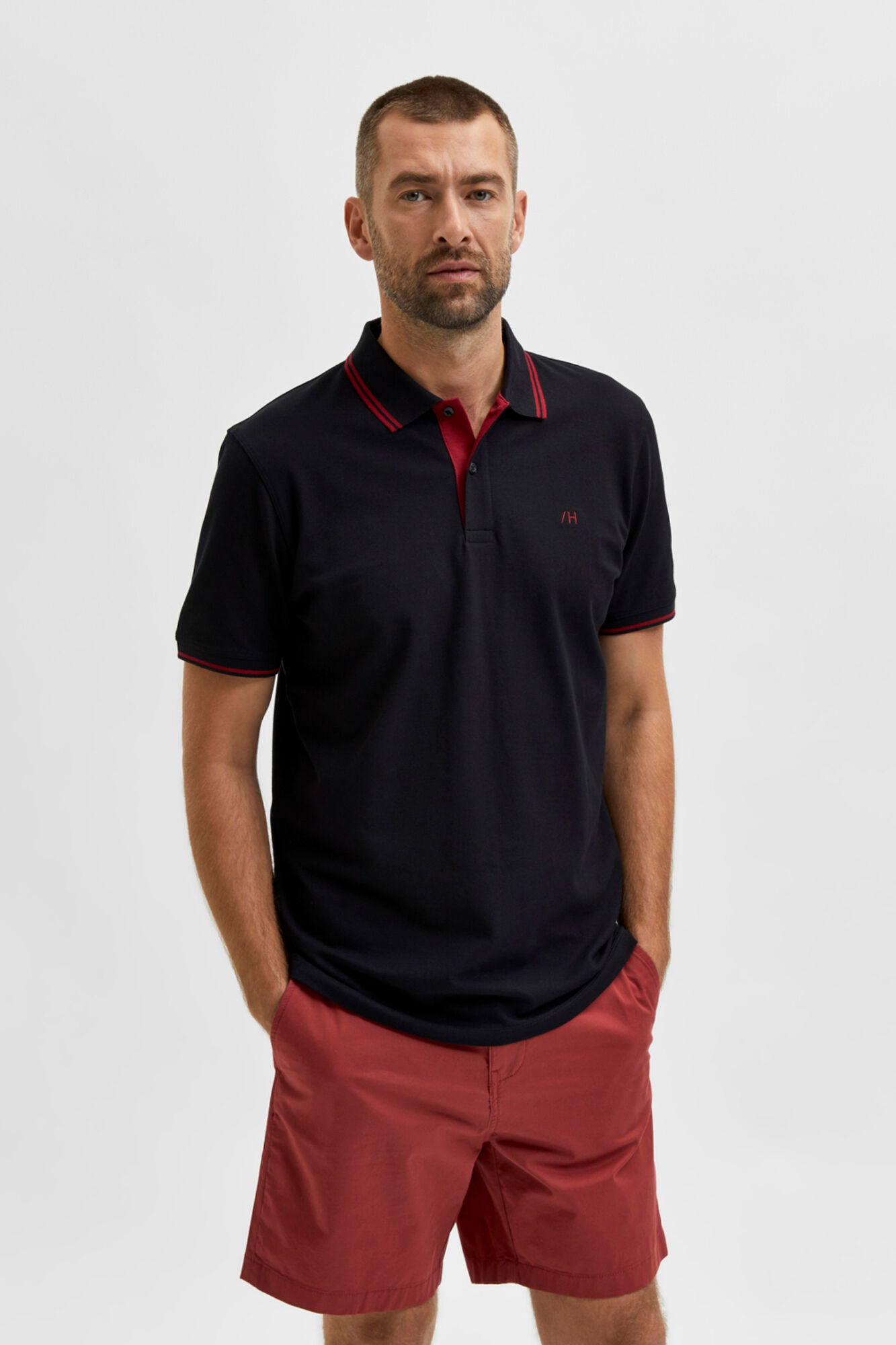 Camisa polo de manga curta com detalhe listrado - Preta