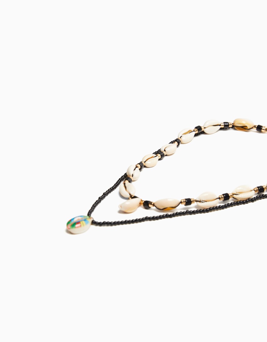 Conjunto de 2 colares com pingente de concha