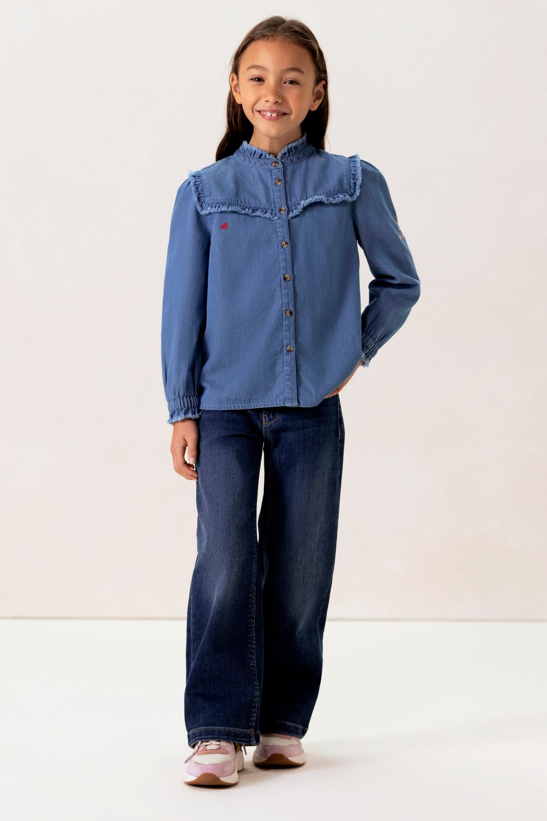 Blauwe denim ruffle blouse