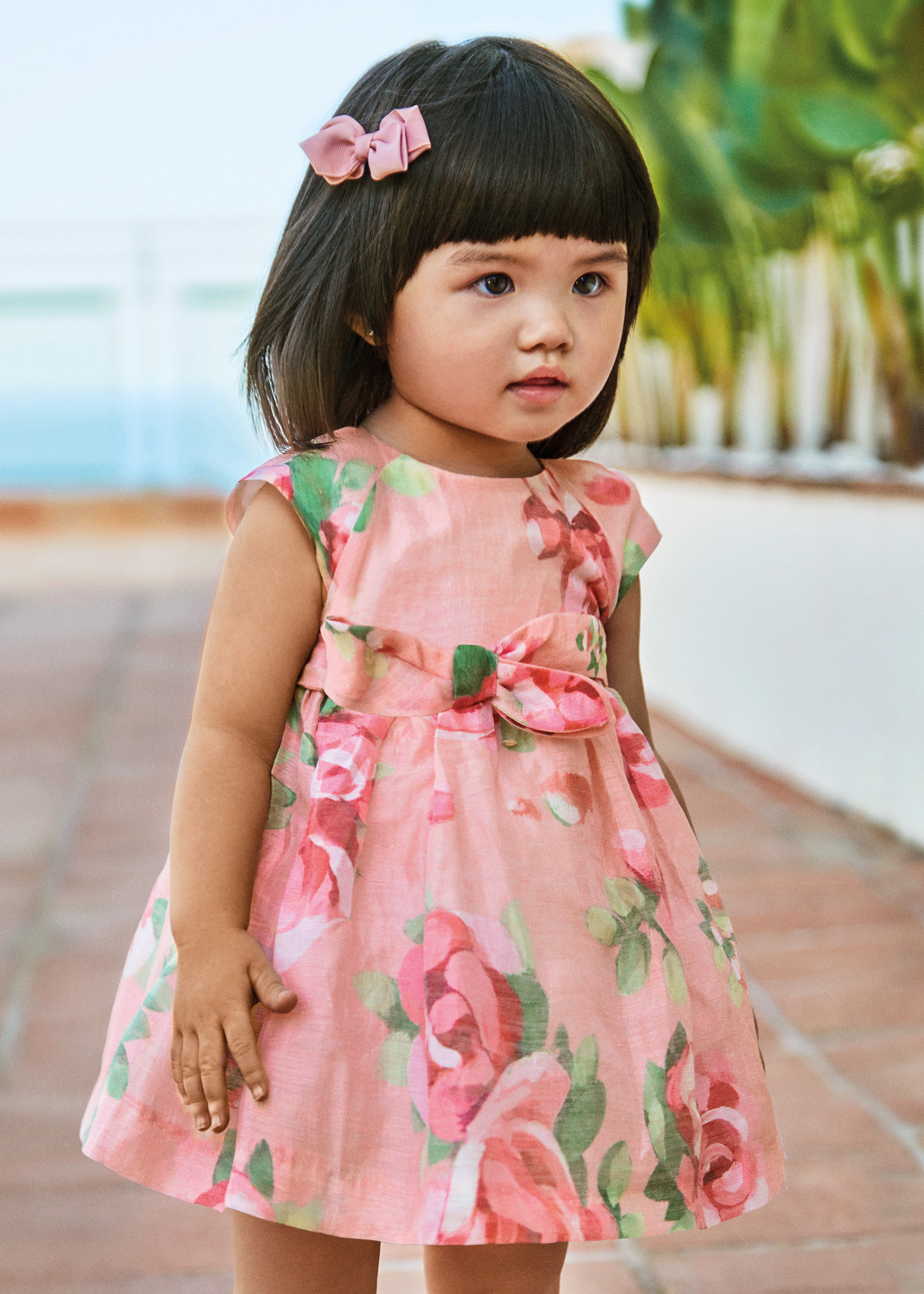 Vestido de bebê em linho com estampa floral