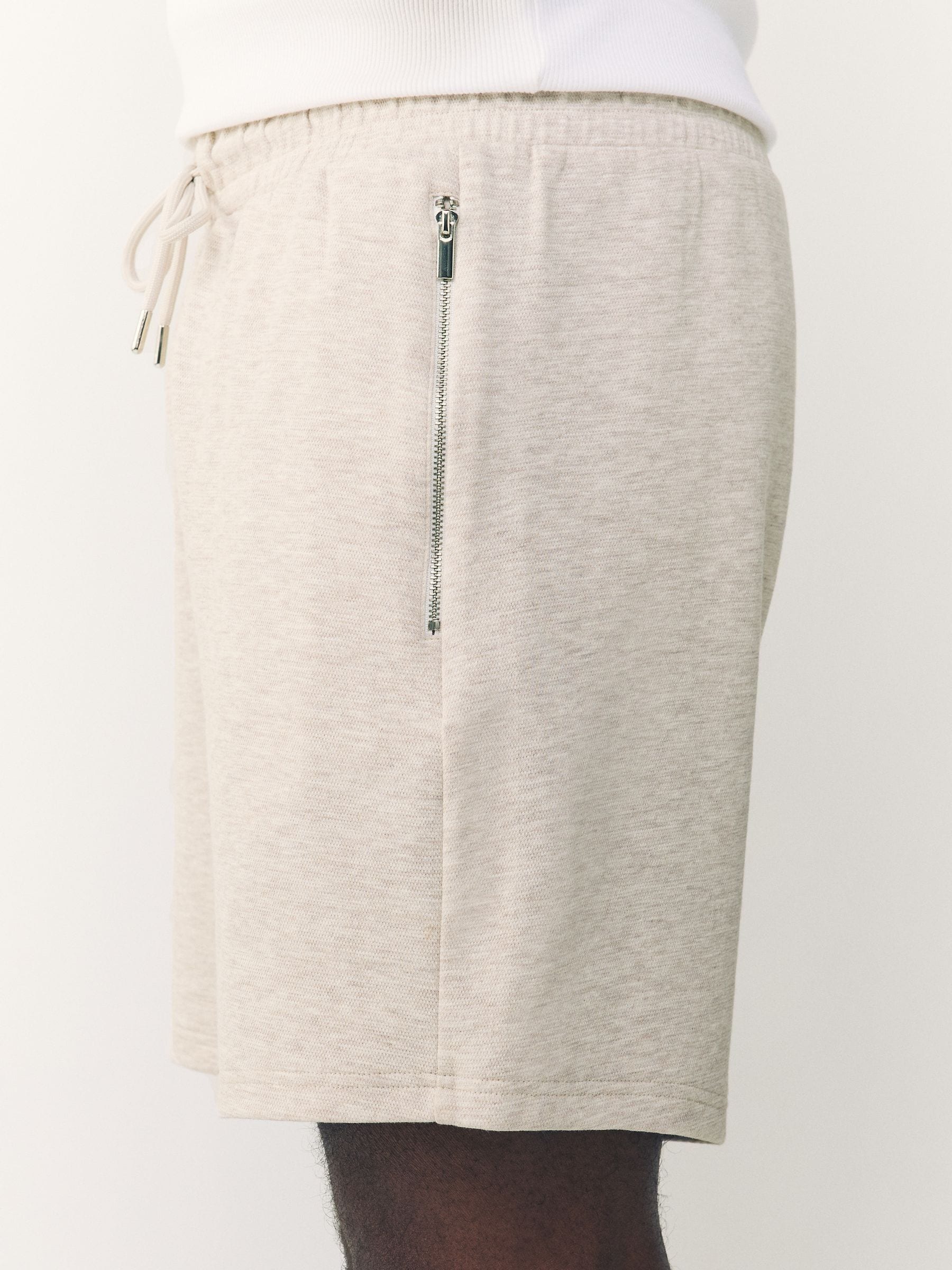 Gemêleerd naturel - Jersey shorts met ritszakje