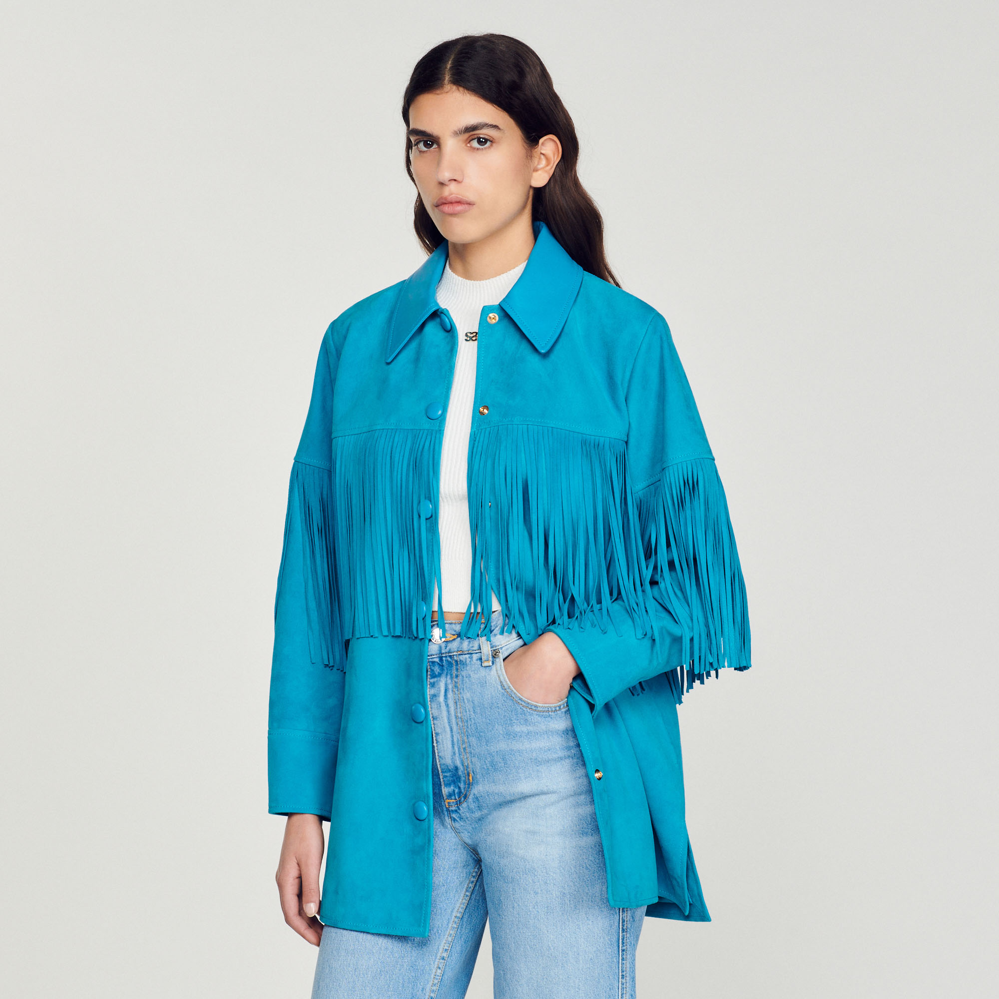 Veste longue en cuir á franges