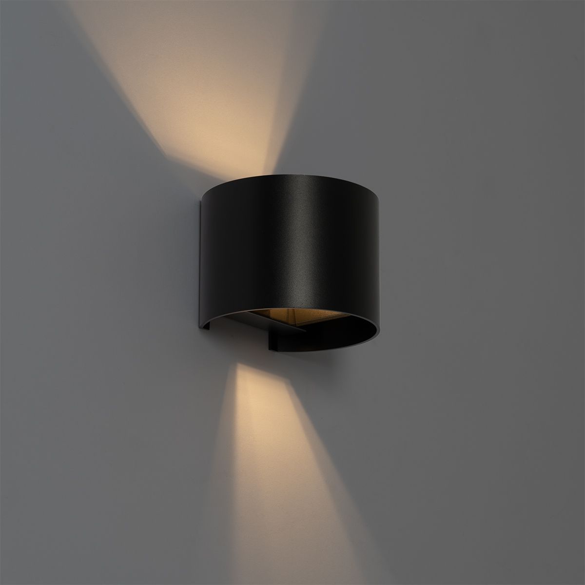 Moderne wandlamp zwart met lichteffect rond - Edwin