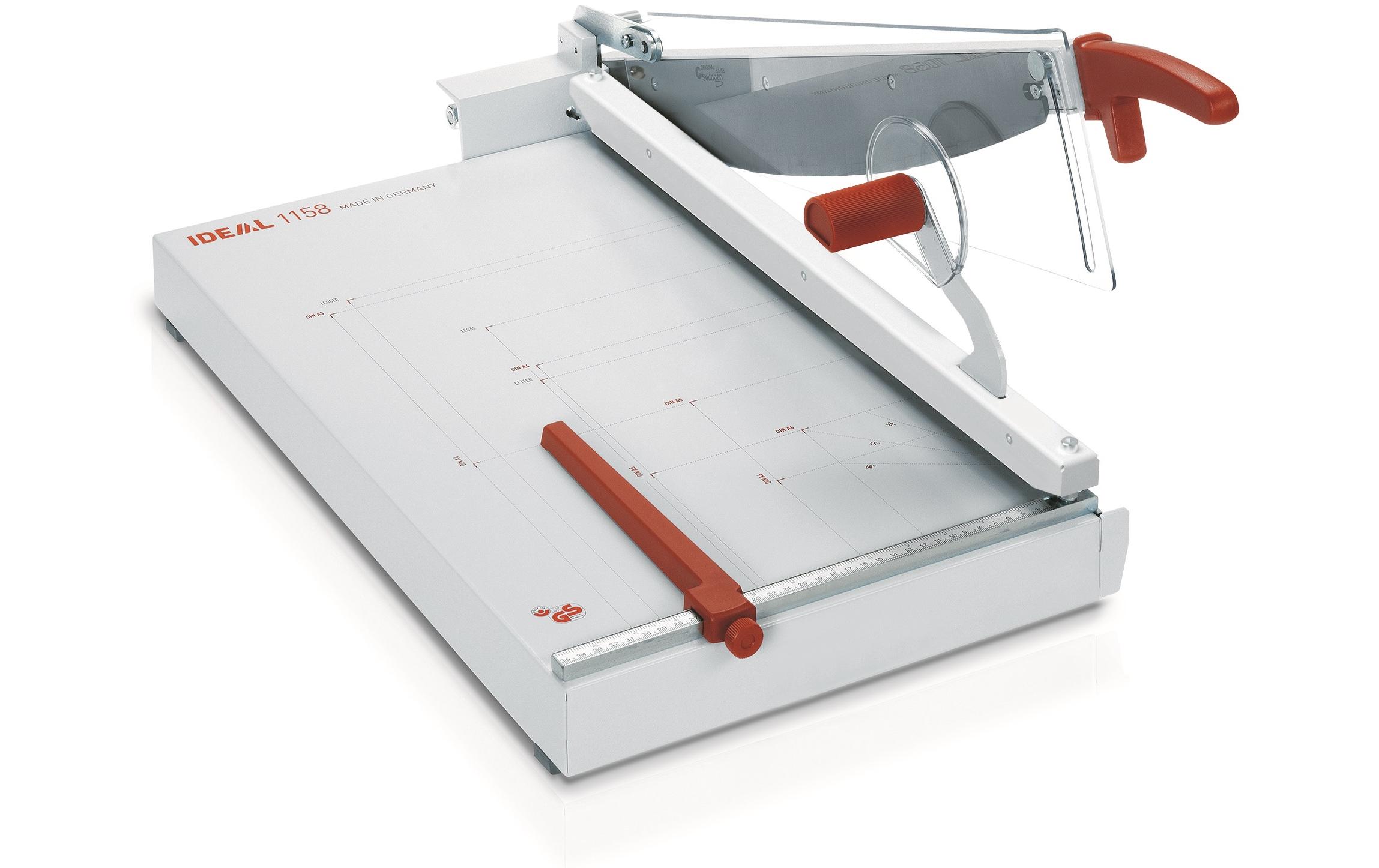 Hebelschneidegerät 1158, 58 cm, 40 Blatt<br>Profi-Hebelschneider mit Papierformaten auf dem Schneidetisch