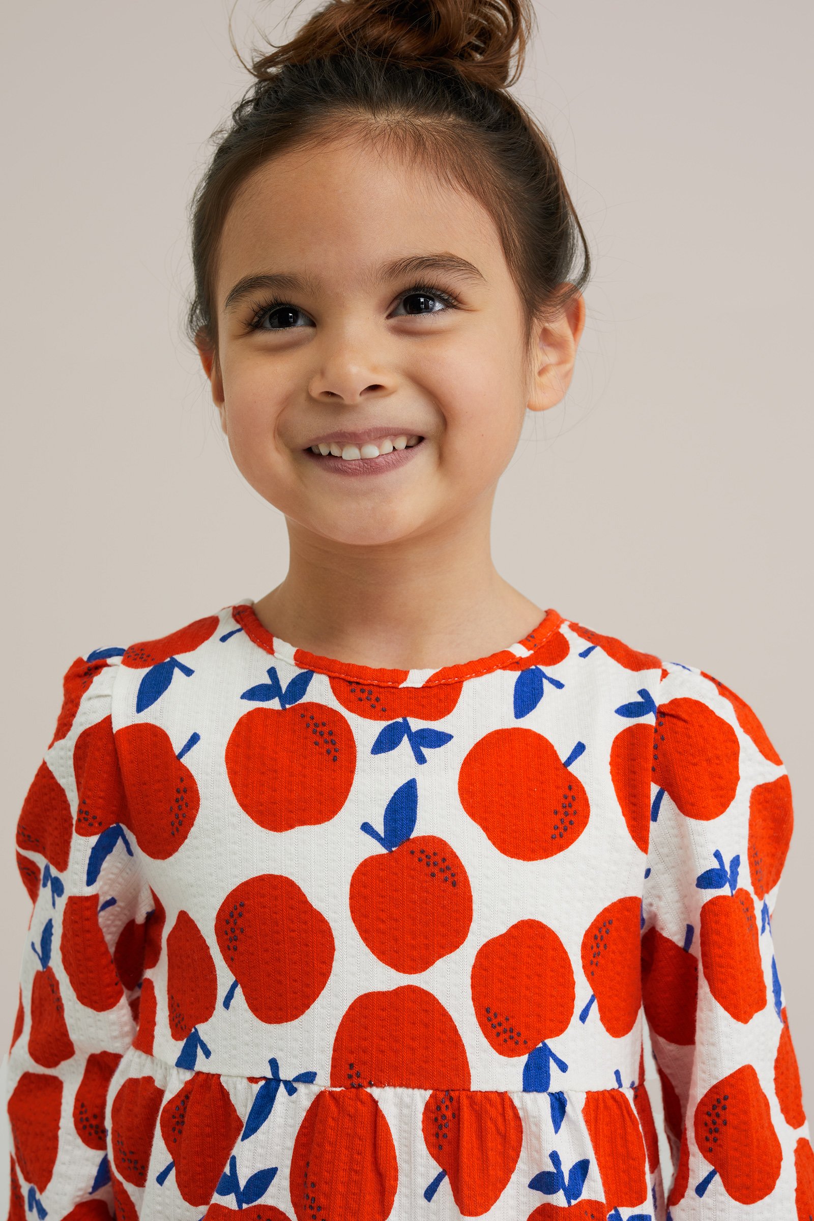 Meisjes jurk met dessin WE Fashion Feloranje
