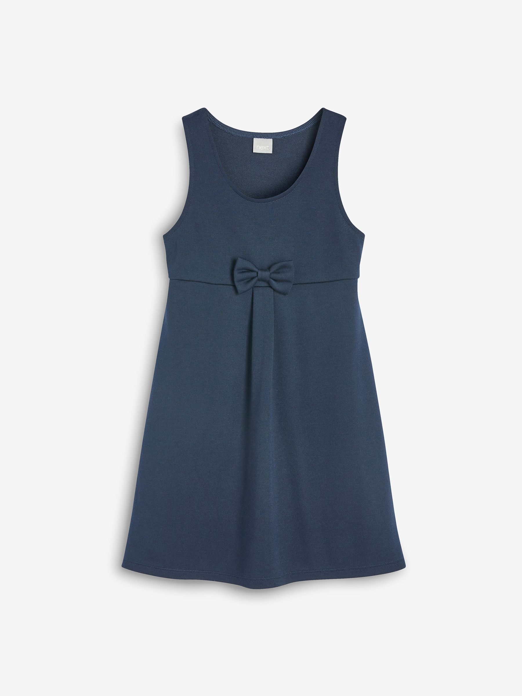 Marineblauw - Jersey stretch schoolovergooier met strik (3-16 jr)