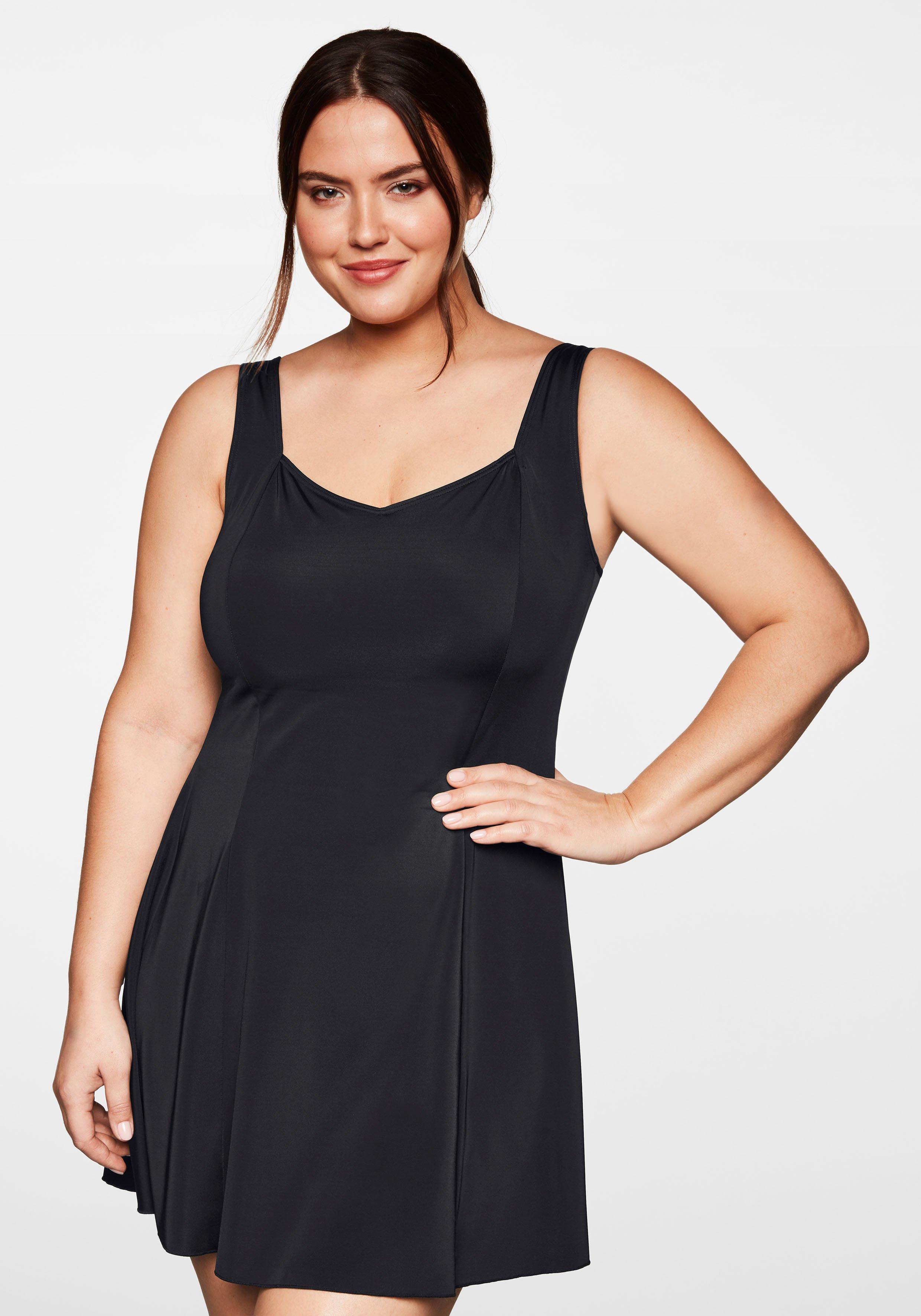Badekleid mit V-Ausschnitt und integrierter Hose.