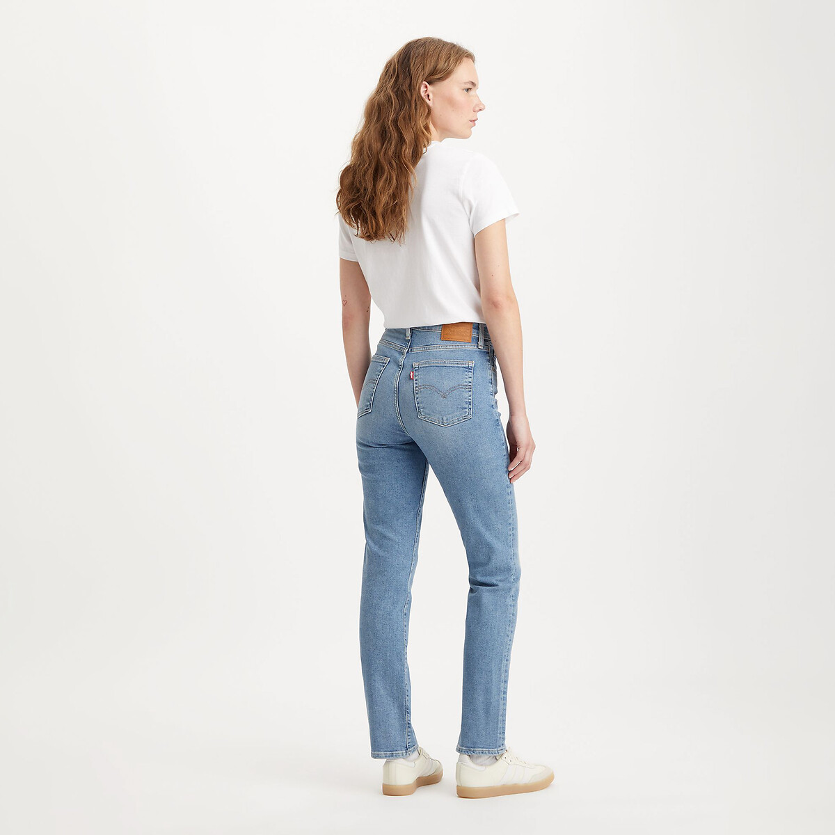Calça jeans Levi's 724 de cintura alta e corte reto.