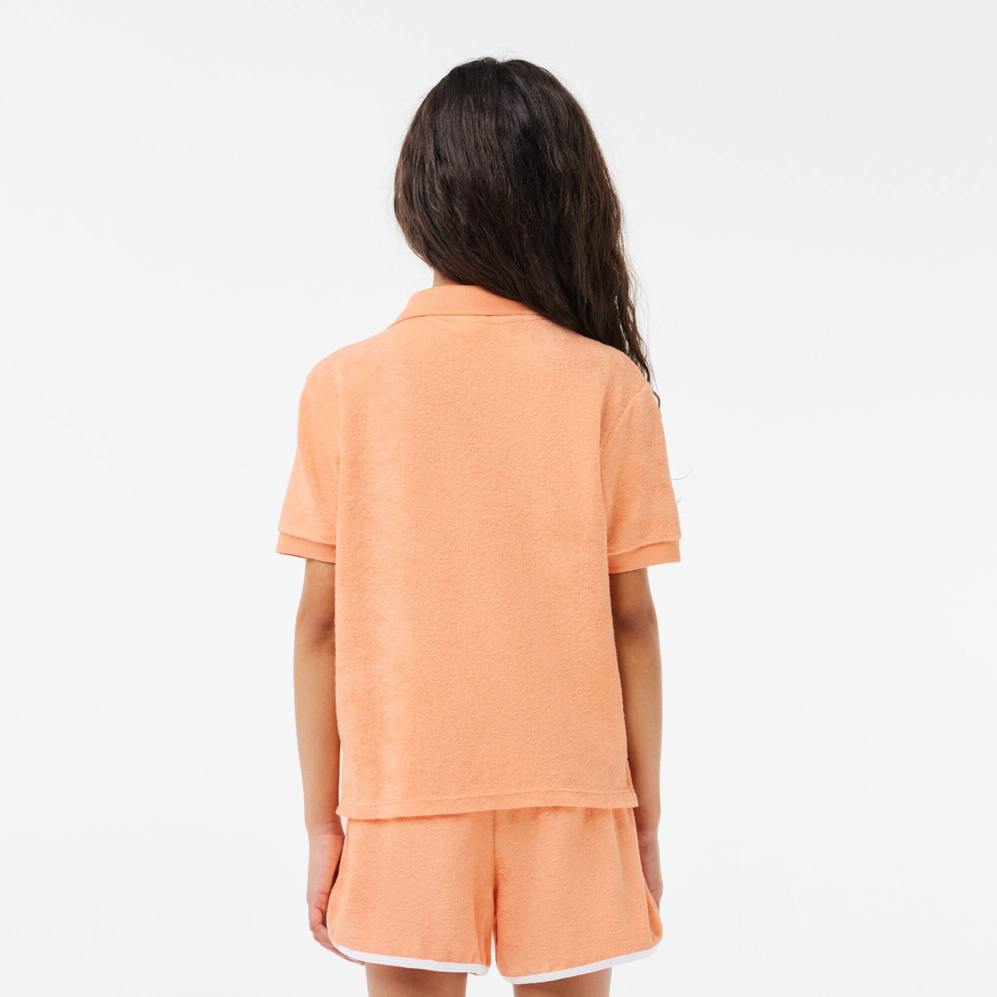 Poloshirt aus Frottee-Baumwolle Poloshirts - Orange - Lacoste - Mädchen