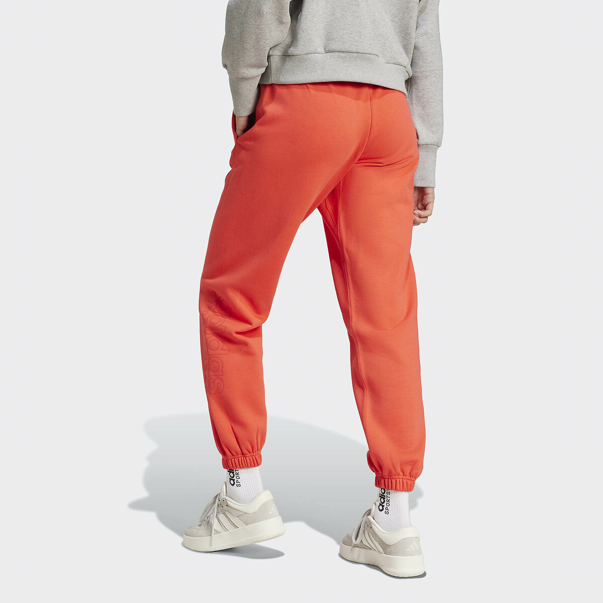 ADIDAS ROUPAS ESPORTIVAS<br>Calça de corrida larga com estampa para todas as estações
