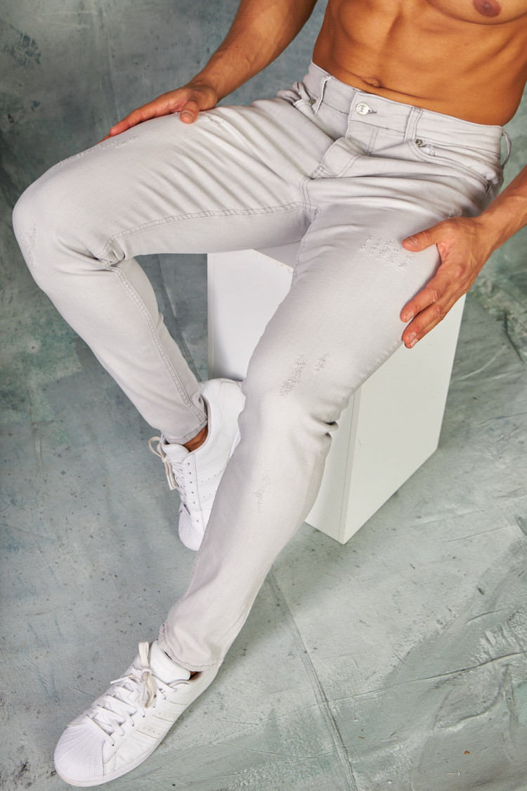 Jeans skinny gris clair griffé