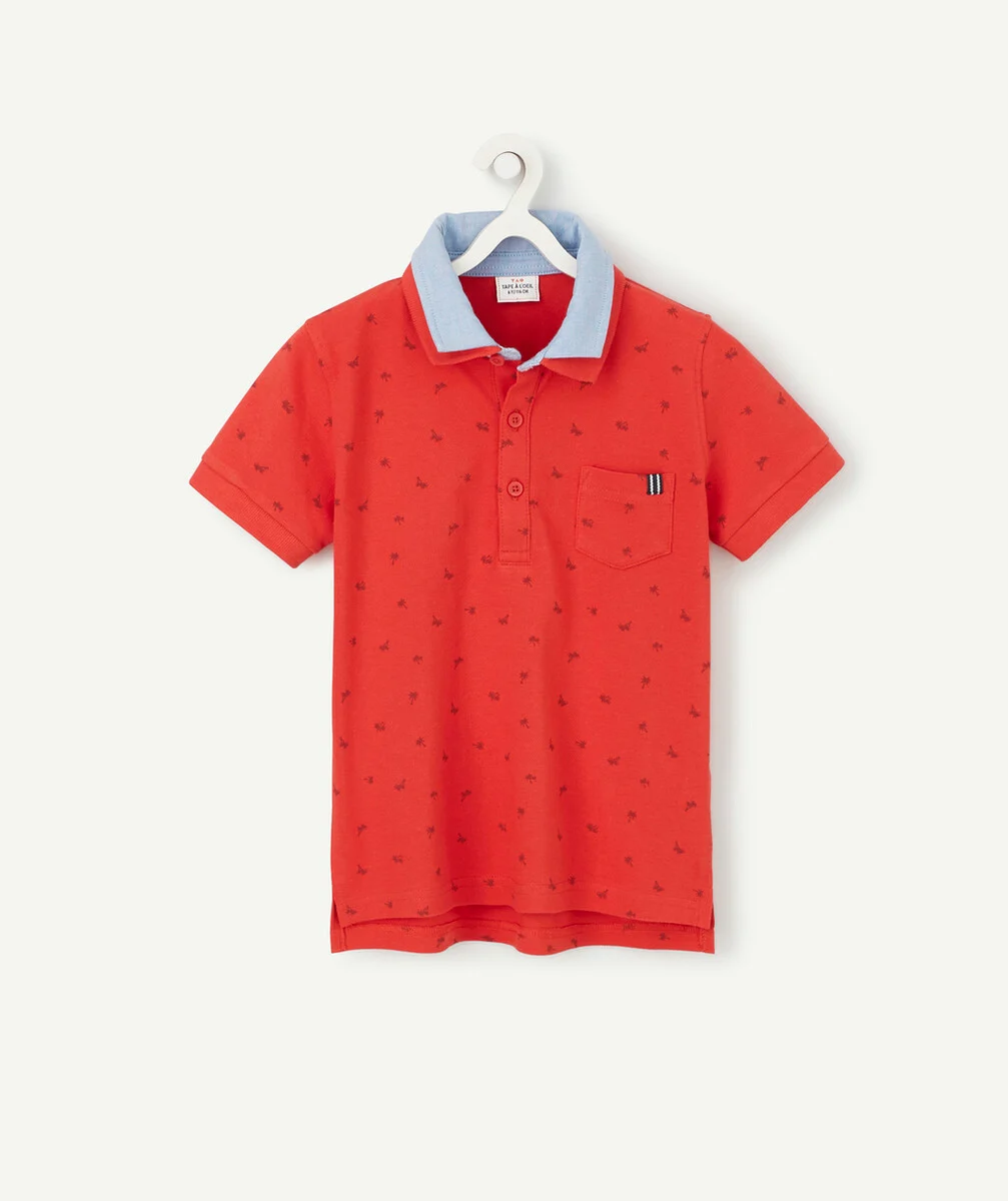 LE POLO ROUGE DOUBLE COL AVEC ANIMATION PALMIERS