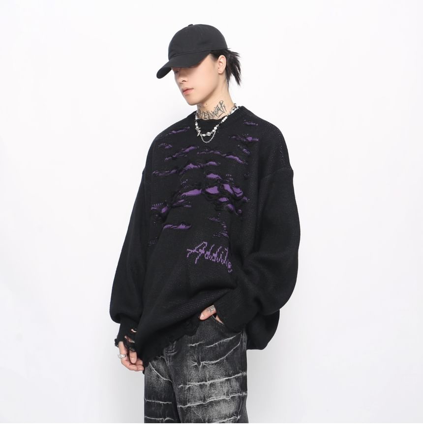 Derbundy - Oversized trui met ronde hals en distressed letters