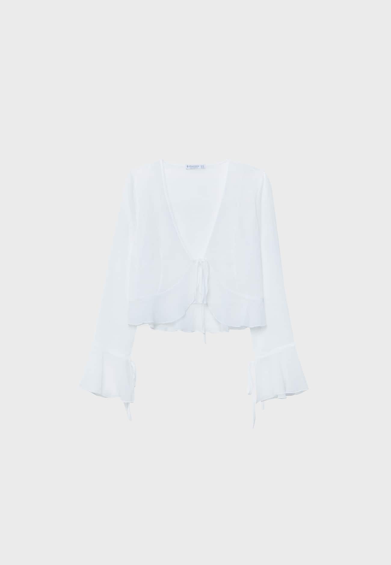 Blusa aberta e fluida com nó.