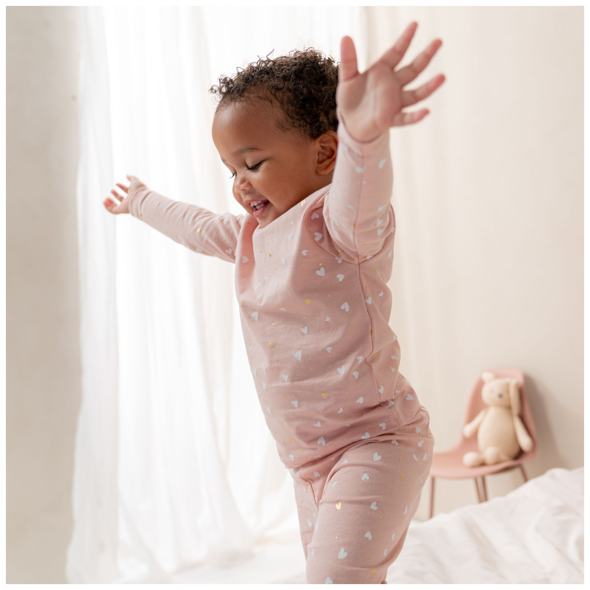 Prénatal peuter pyjama hartjes roze